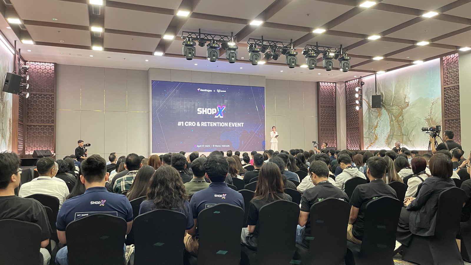 A full ballroom of ecommerce operators at ShopX 2025, Mövenpick Living West Hanoi