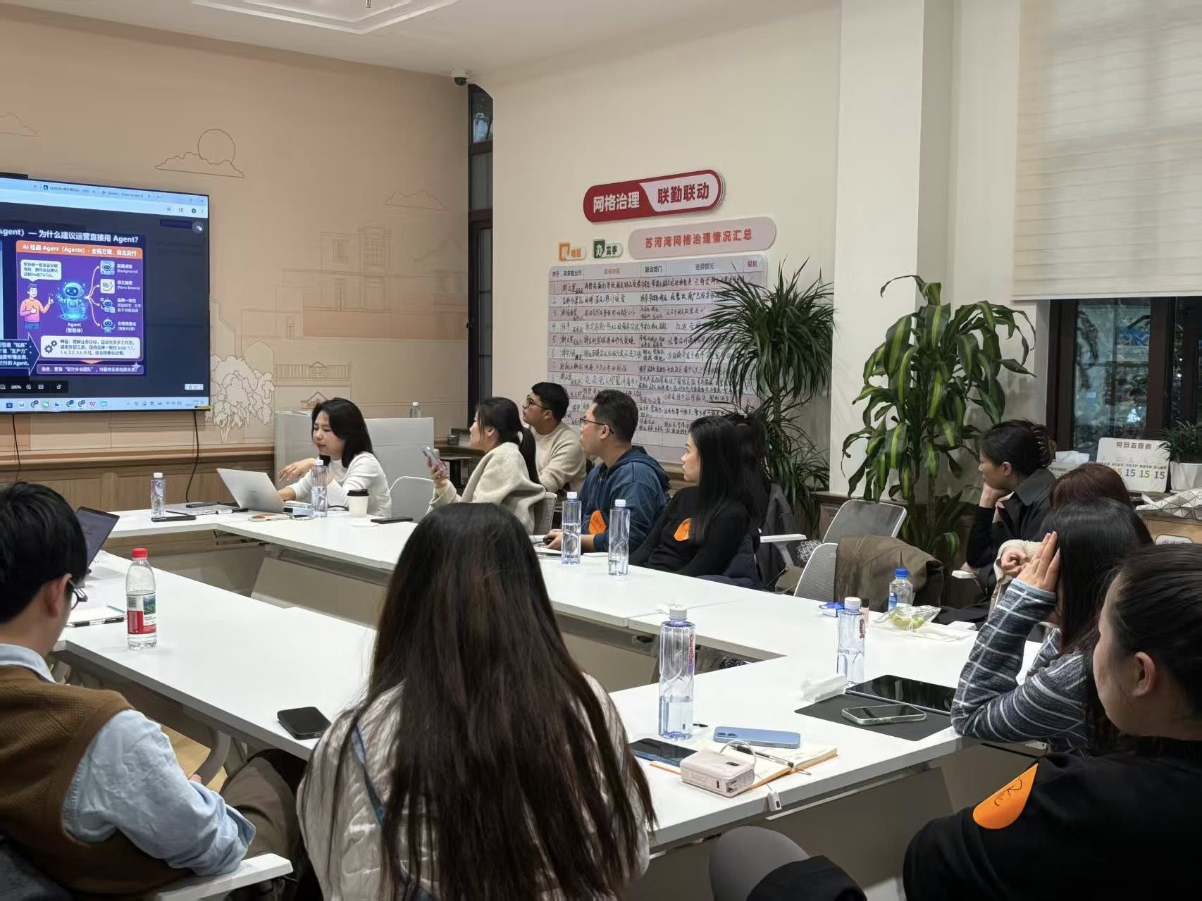Speaker with a simple visual on screen at the Shanghai Coffee Chat
